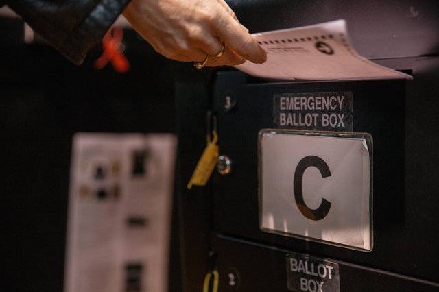 A ballot is stored for scanning later at a poll site in Crown Heights on Election Day.